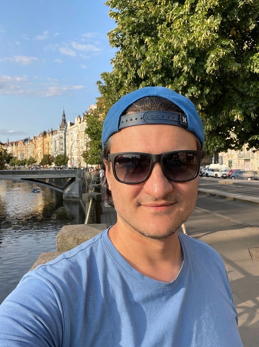 Andry, founder of CozyRelic, by the river in Prague